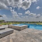 modern grey stone swimming pool